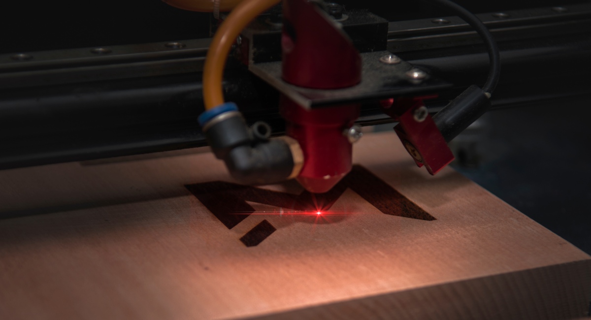 Fiber laser engraving on precision machined components
